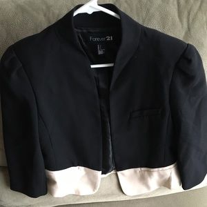 Black and White (Off-white) cropped blazer.